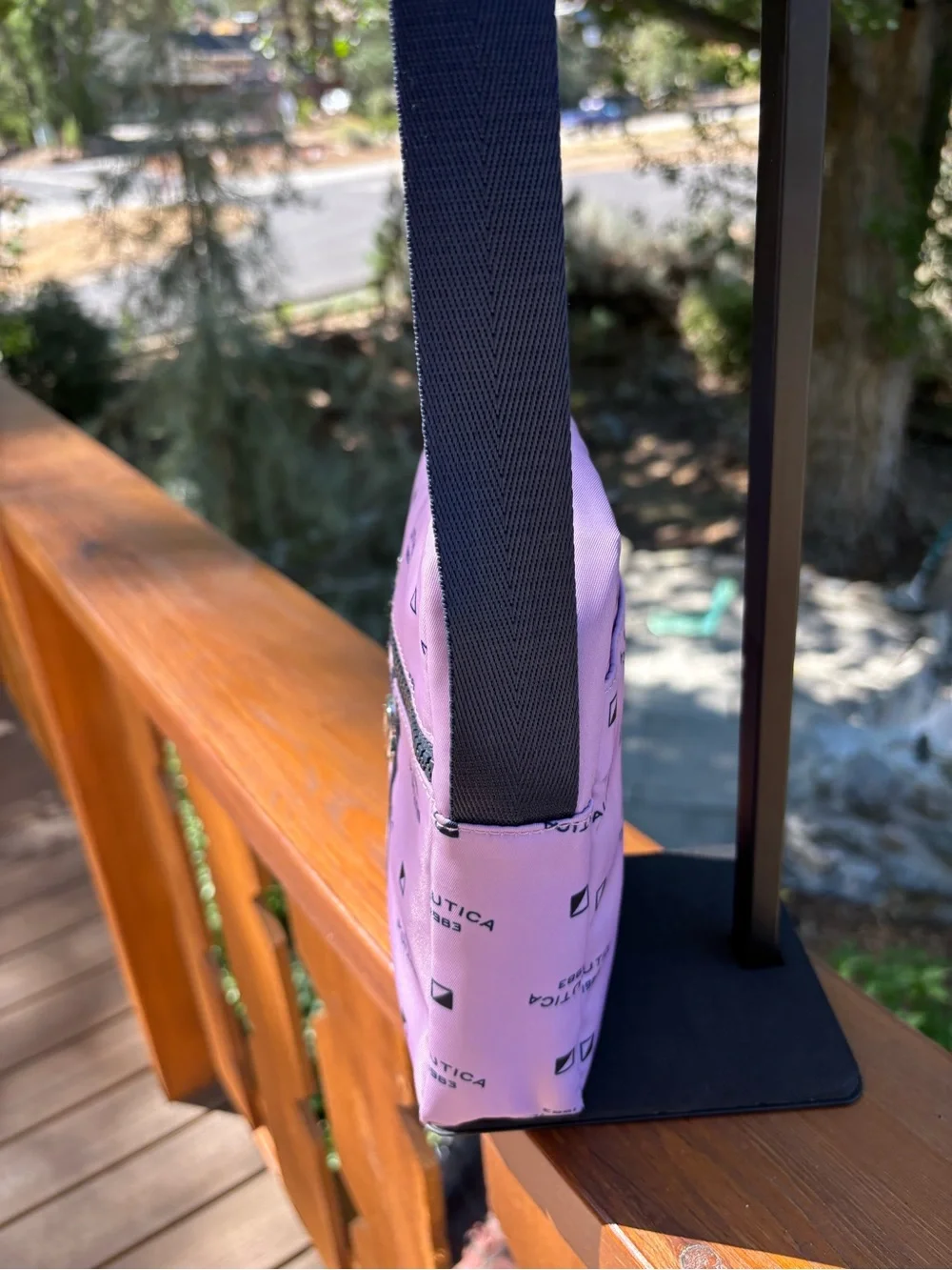Nautica Pink Logo Print Crossbody Bag with Navy Strap and trim.